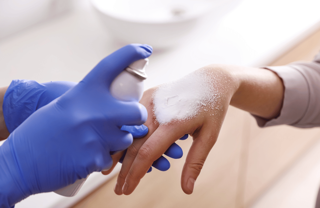 Photo of a doctor treating a child burn injury