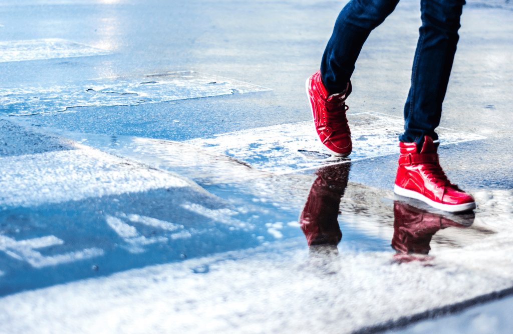 Photo of a pedestrian crossing the street in the Bronx