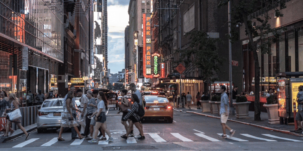 People crossing busy NYC street