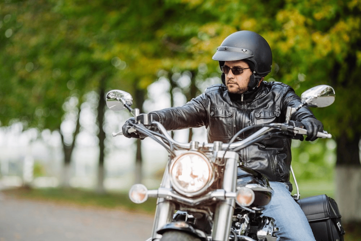 Motorcycle rider wearing helmet