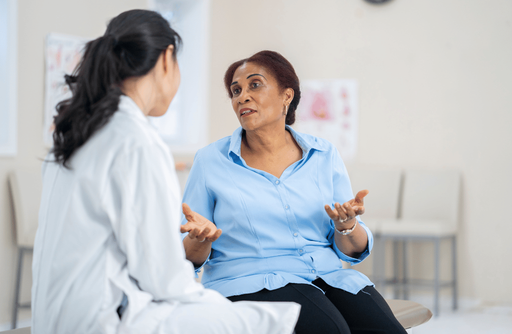 Doctor speaking to patient about cancer from hair products