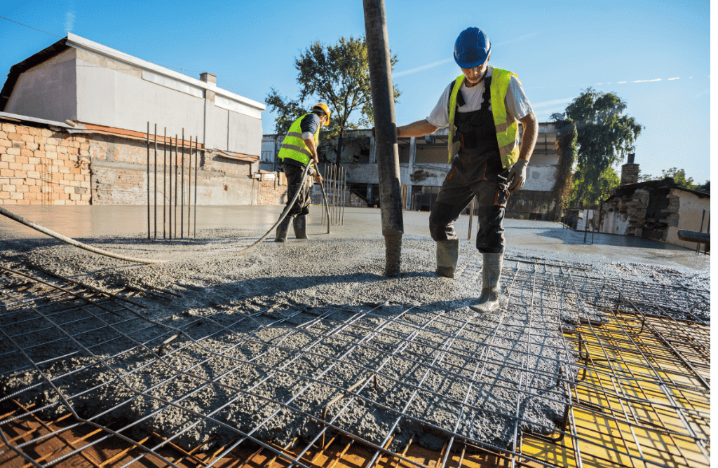 Photo of workers pouring concrete at Philadelphia job site