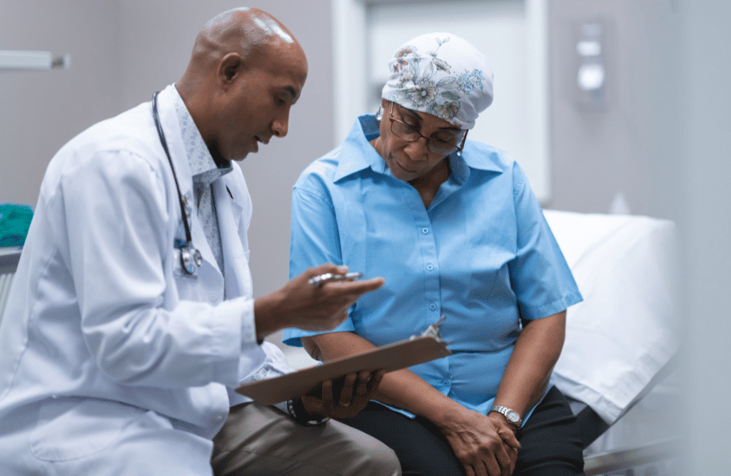 Photo of doctor talking to ovarian cancer patient