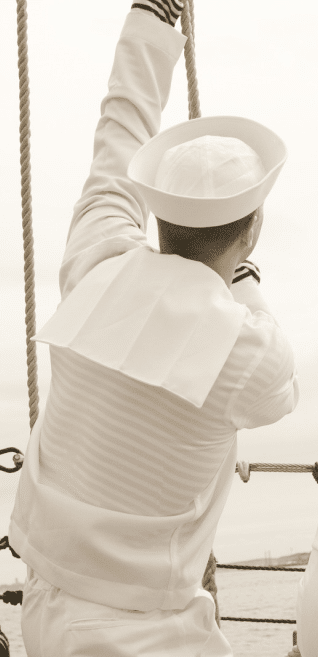 U.S. Navy shipman pulling a rope