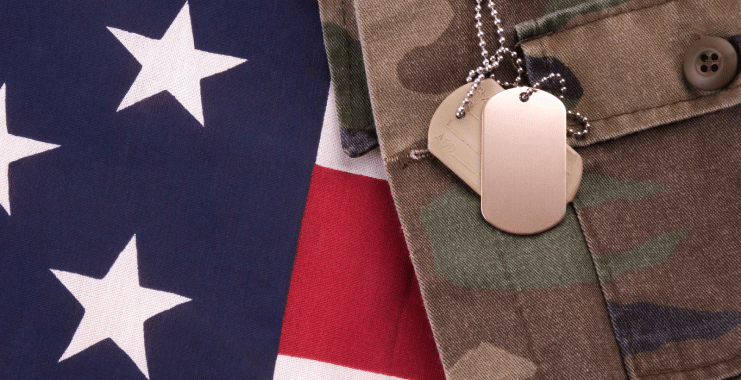 U.S. army uniform, dog tag, and U.S. flag